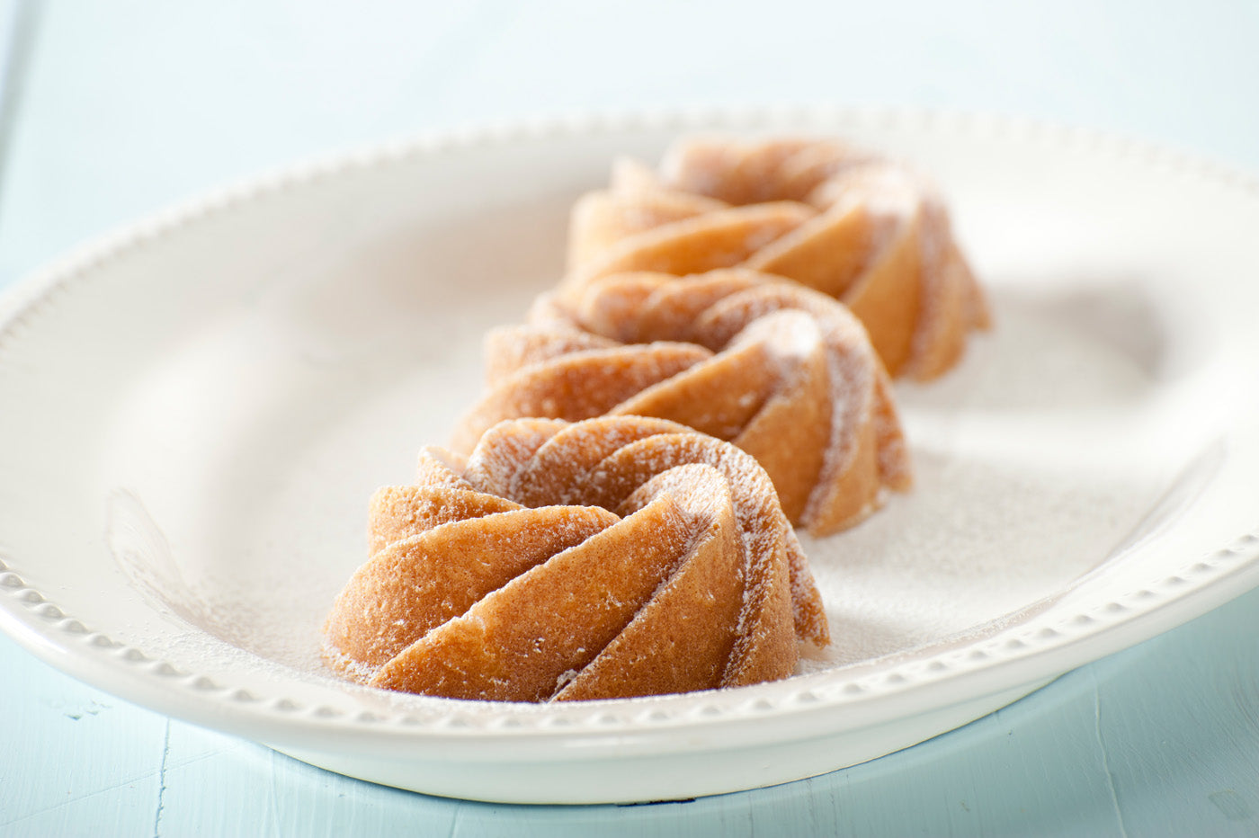 Nordic Ware Cast Aluminum Heritage Bundtlette Cakes, Gold Discount